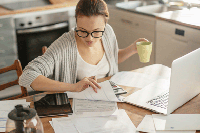 Woman looking at paperwork